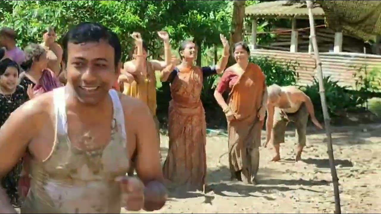 কাদা খেলা। বাড়ির দুর্গাপূজা