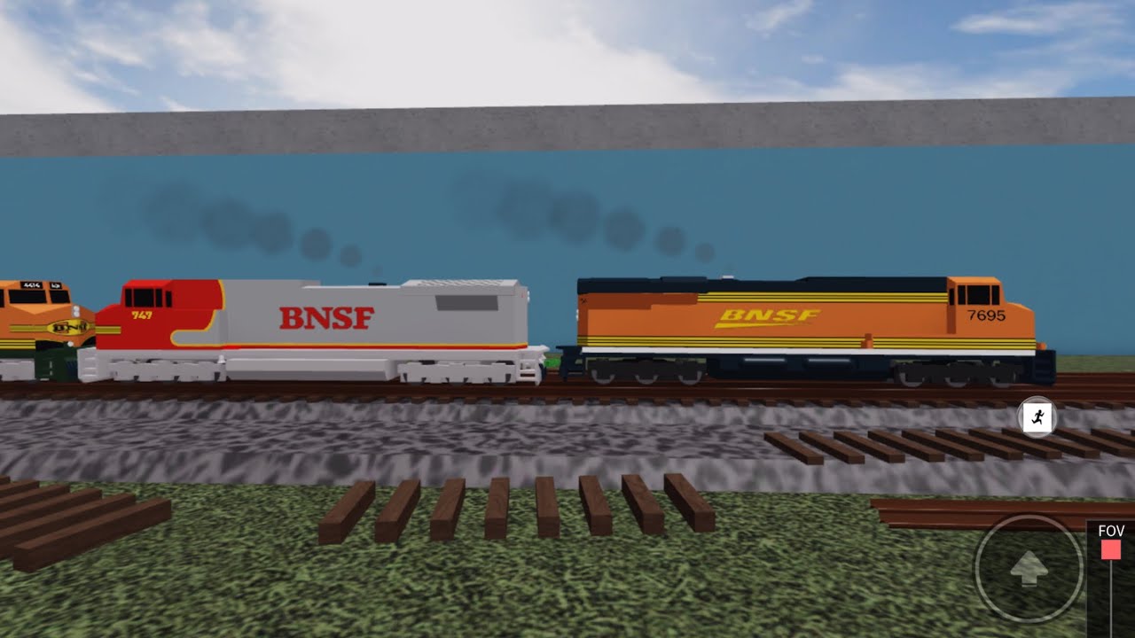 Chasing BNSF Grain Train with BNSF 7695 leading and BNSF 747 trailing