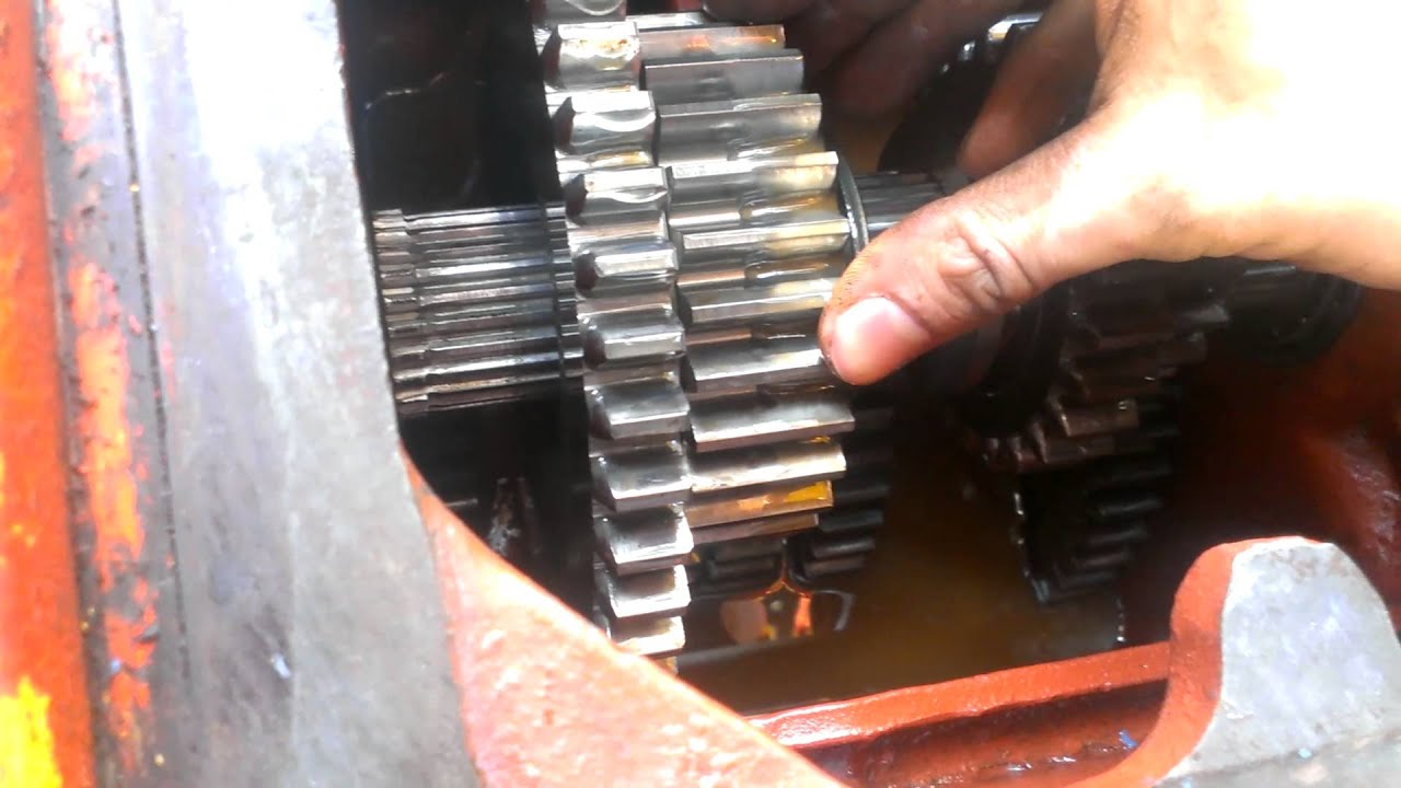 Exposed Transmission Gears From Case 580CK Backhoe