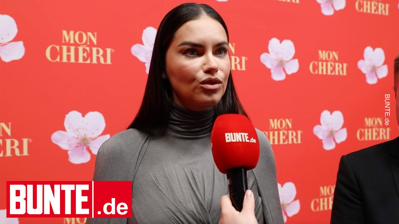 Adriana Lima – Auf dem roten Teppich stärkt er ihr den Rücken