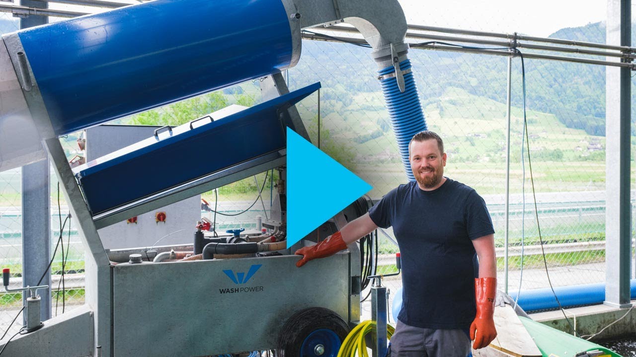 Pumping trout at Brüggli Forellen fish farm in Switzerland