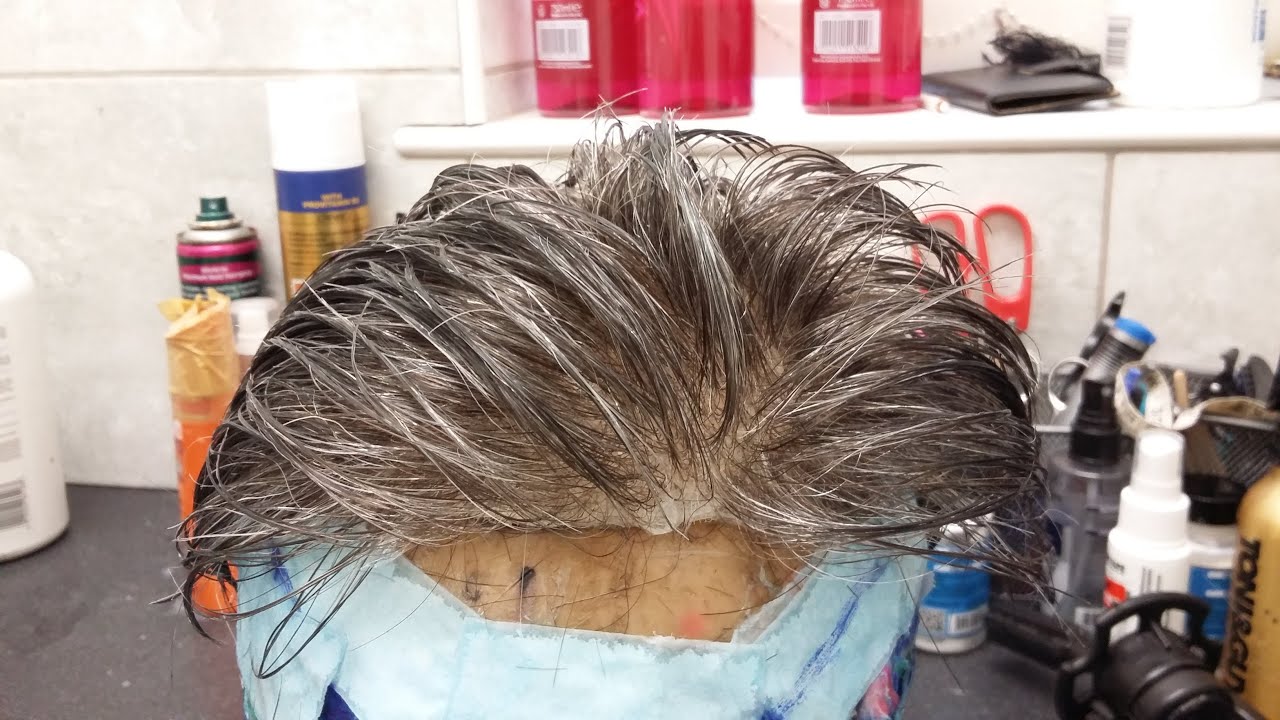 Hair Replacement System with 50% grey cut and styled on mannequin