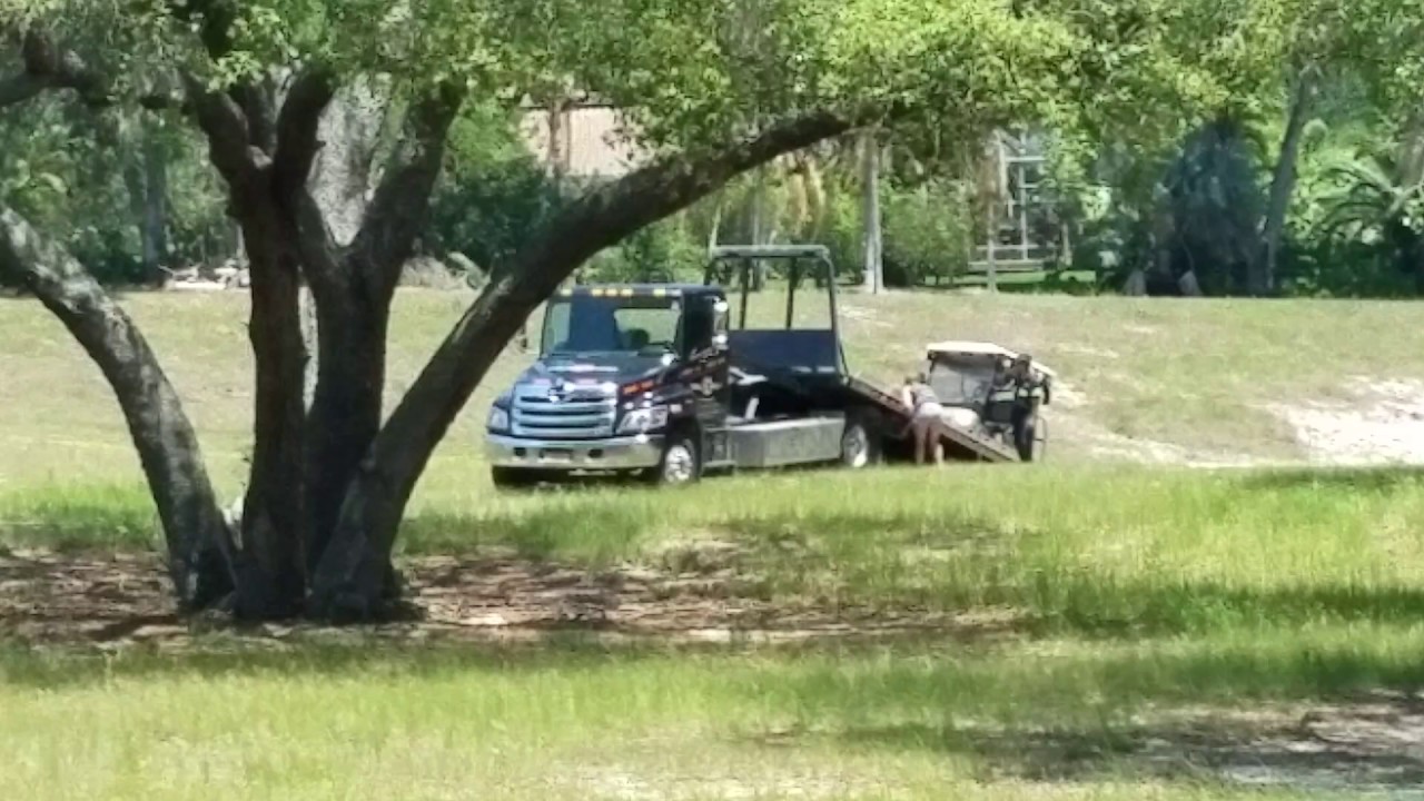 Golf cart involved in fatal accident is pulled from retention pond