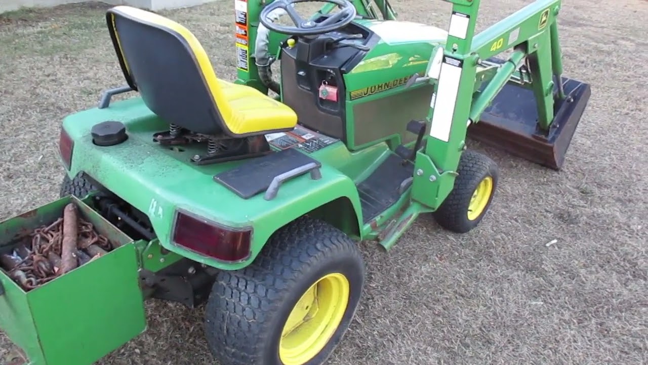 JOHN DEERE 425 TRACTOR WITH 40 LOADER