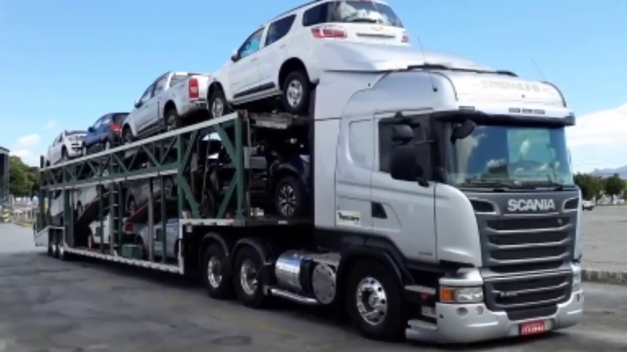 cegonheiro mostra a posição dos carros e altura da carga