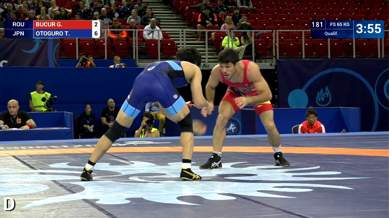 Qual. FS - 65 kg: G. BUCUR (ROU) v. T. OTOGURO (JPN)