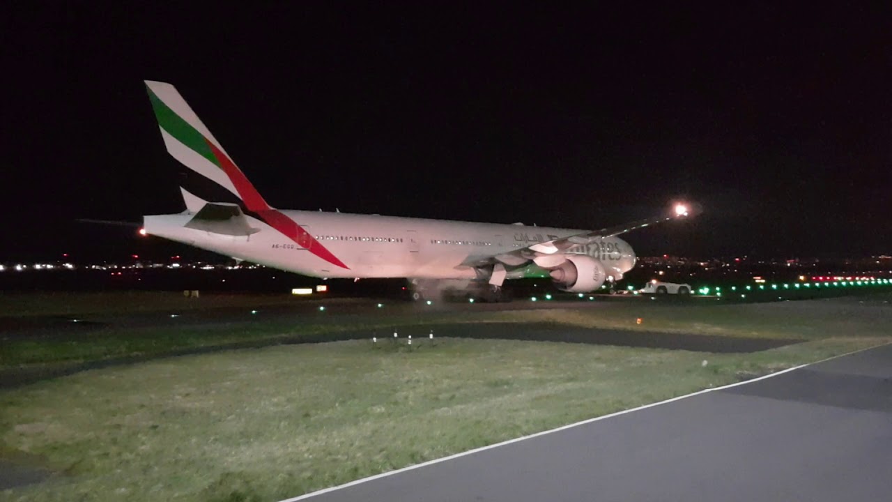 Emirates B777-300ER pushback Glasgow airport  17/03/2019.