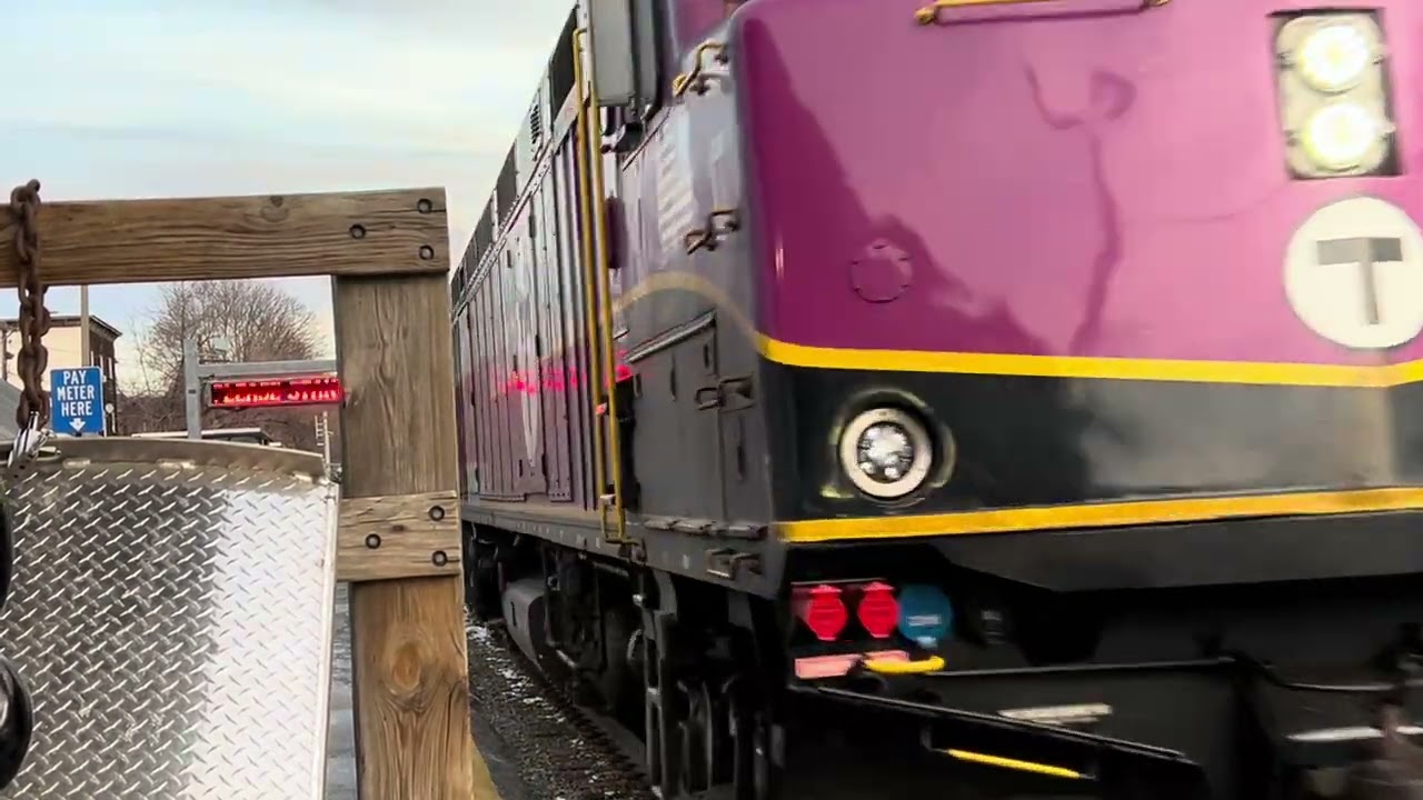 MBTA train #1068 outbound approaching Waltham with a horn salute