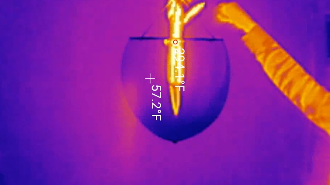 Flaming invisible inverted tornado inside a giant bubble