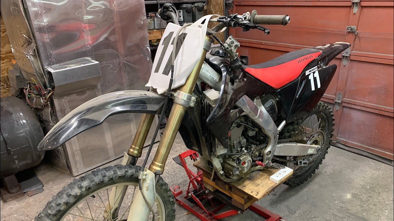 2004 HONDA CRF250 REBUILD PT 1 (Tear down) THIS ENGINE IS COMPLETELY LOCKED UP!