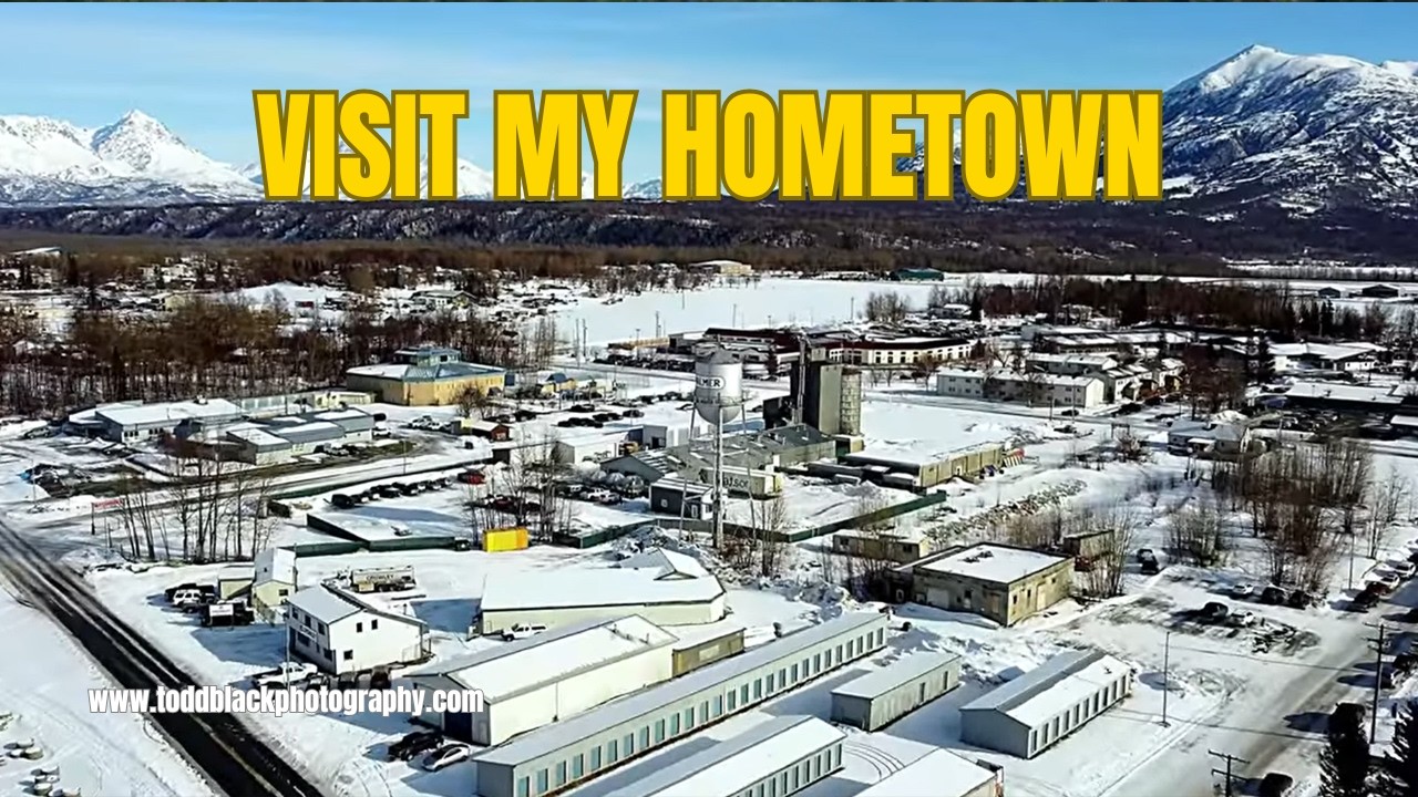 Downtown Palmer Alaska | Water Tower & Snow Capped Mountains | Winter Aerial Drone Footage