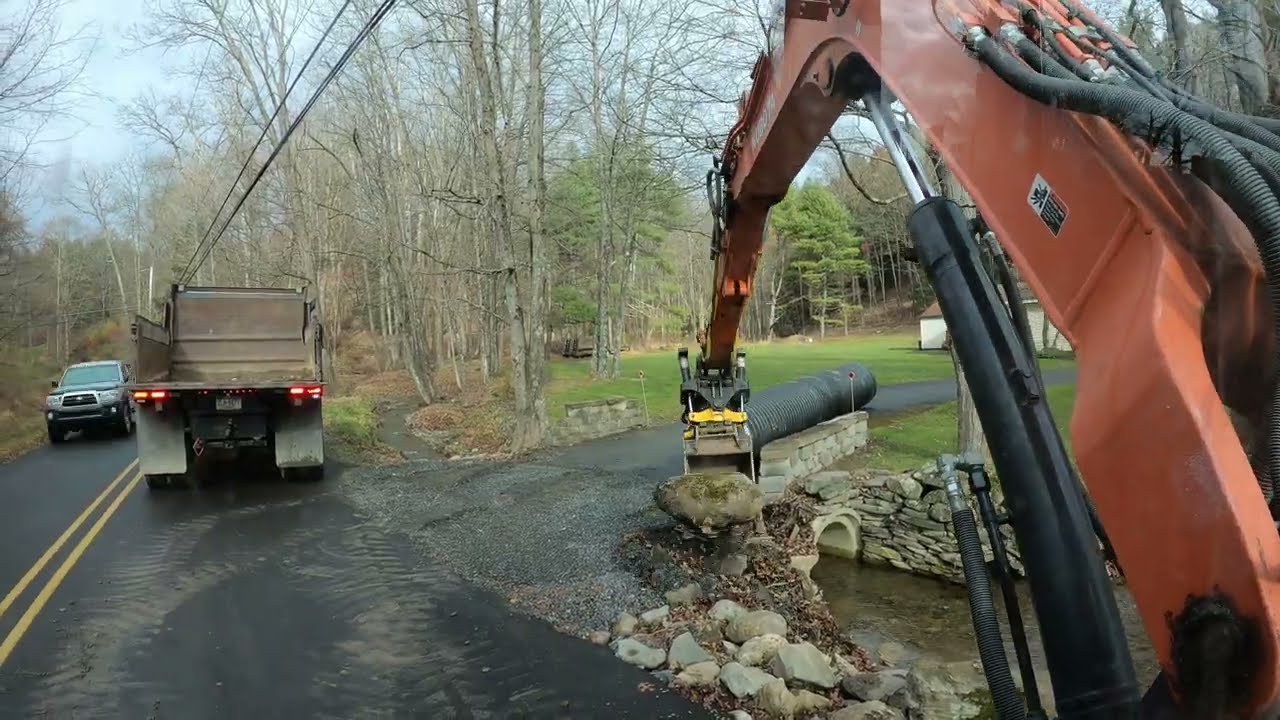 Giant driveway culvert pipe install