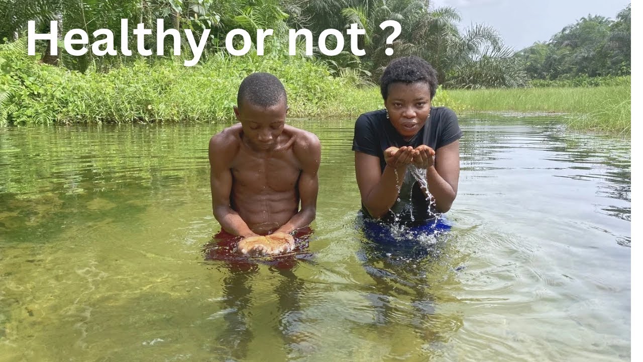 Remote African village: The entire village drinks from this stream 