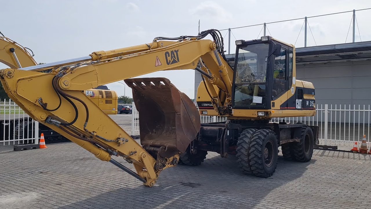 70153285 Caterpillar M315