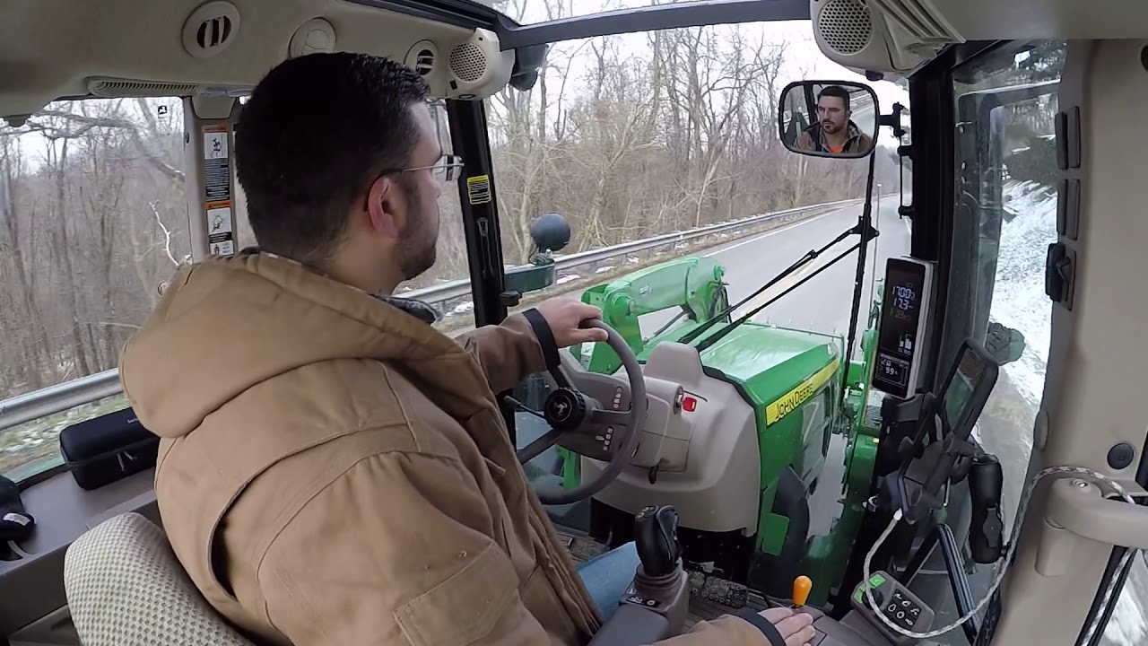 John Deere 5125R with CommandQuad manual transmission on the road