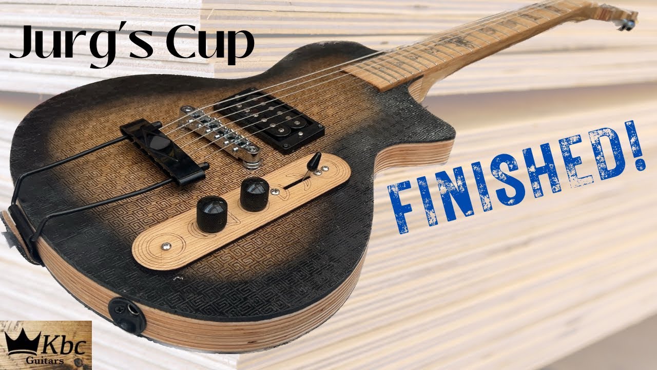 Finally Finished! - Jurg's cup plywood laser guitar