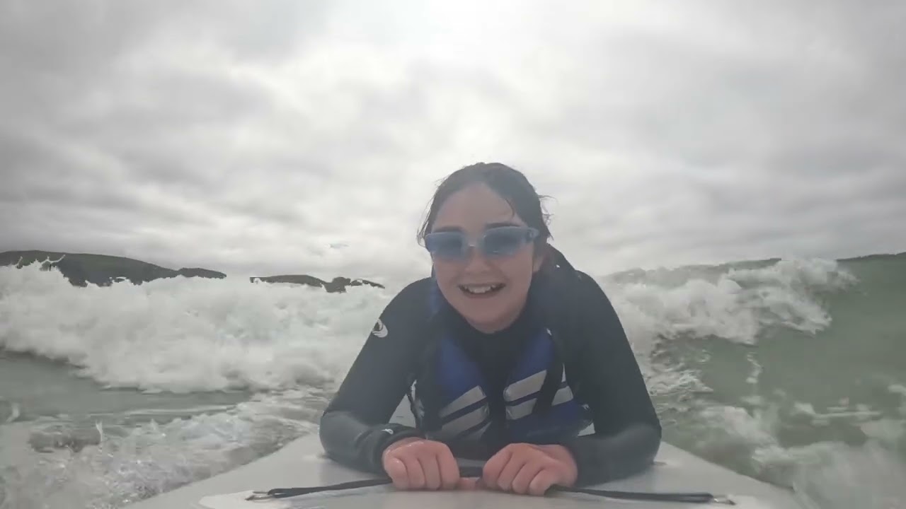 Paddle board Surfing with the girls. Clachtoll Beach Campsite. 