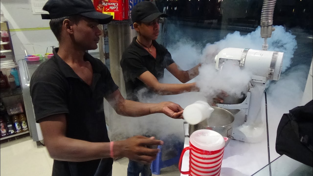 Freshly made Tawa Rolled Ice Cream + Fog Ice Cream made with Liquid Nitrogen, Baben, Bardoli, India.