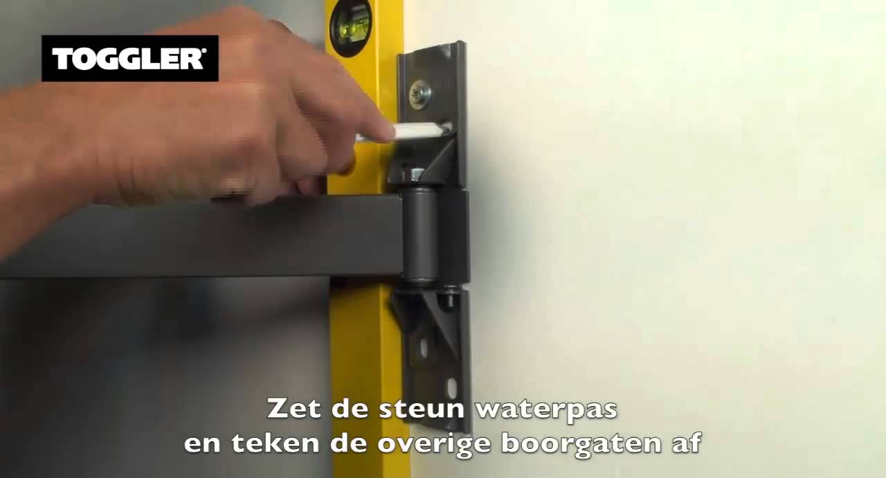 Flatscreen TV met zwenkarm aan gasbeton met TOGGLER Pluggen & Ankers