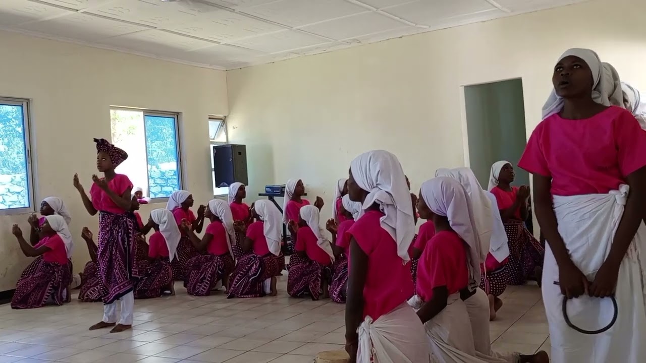 STUDENTS PERFORMING MIJIKENDA SACRED SONG