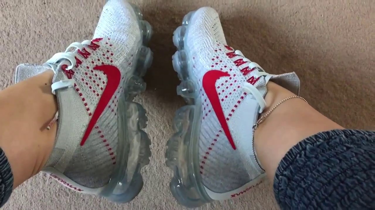 Girl in Nike Air Vapormax and her sockless feet