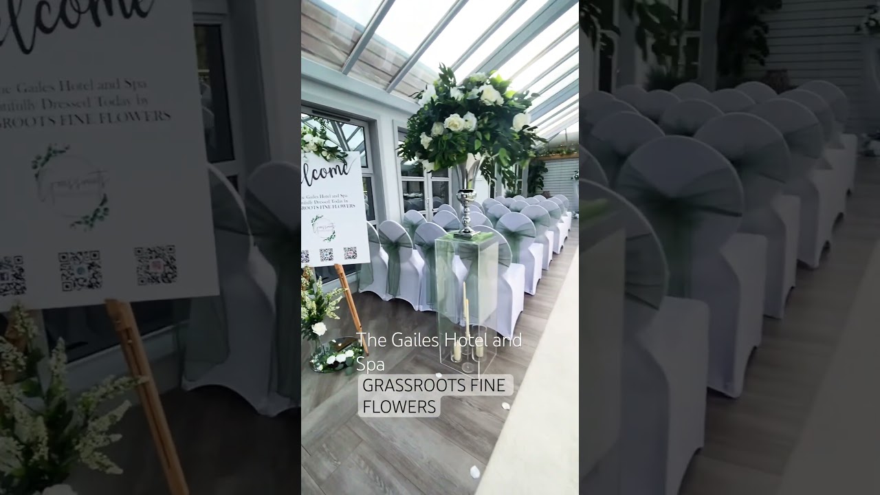 The Rooftop Conservatory set up for a Wedding Ceremony. Designed in Ivory Flowers with Eucalyptus