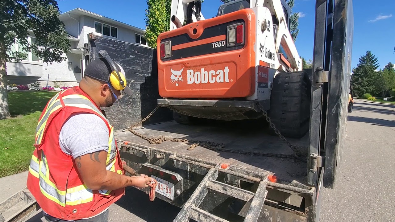 How I load my Bobcat T650 onto my Big Text 25du dump trailer