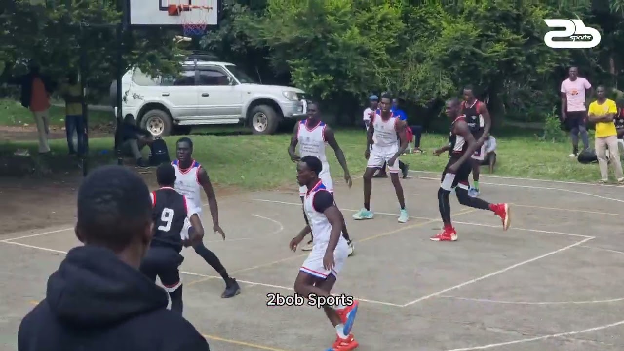 Kibuli S.S connection. Youngsters Rodney Ainebyona and Nyakoujo Jonathan combined on this basket