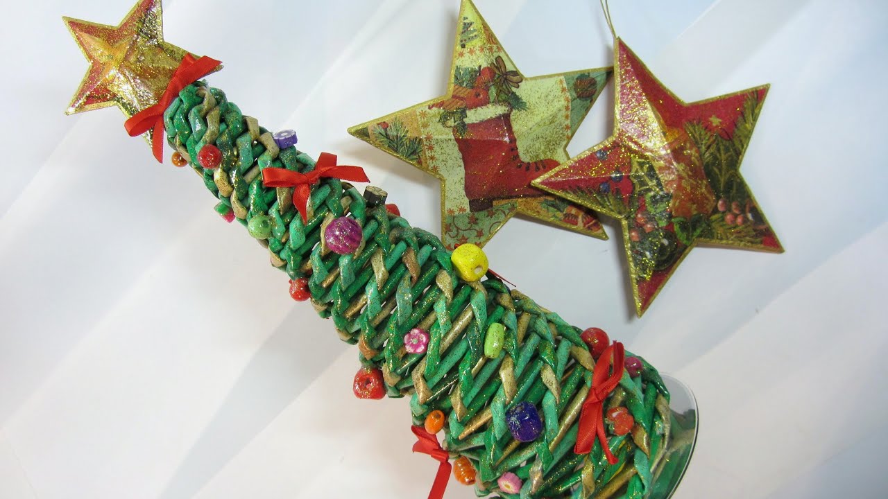 Como hacer un árbol de Navidad hecho con papel periódicos. Tree made with newspaper.