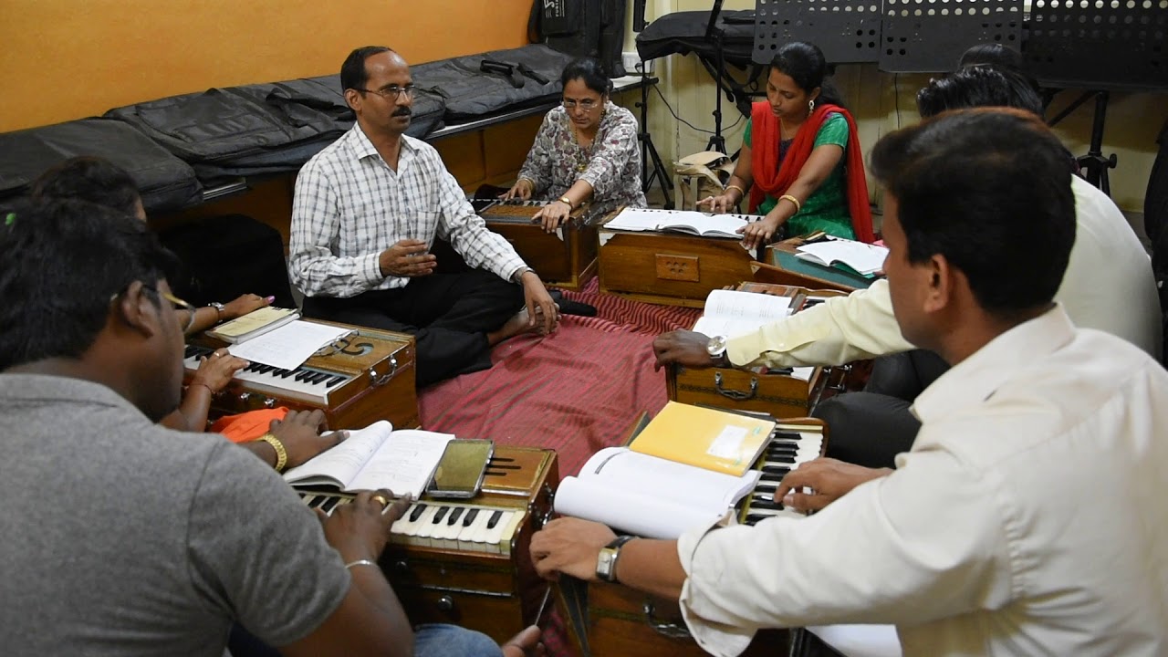 Shri Vilas Kundekar giving harmonium lessons at Vyas Sangeet Vidyalaya , Dadar