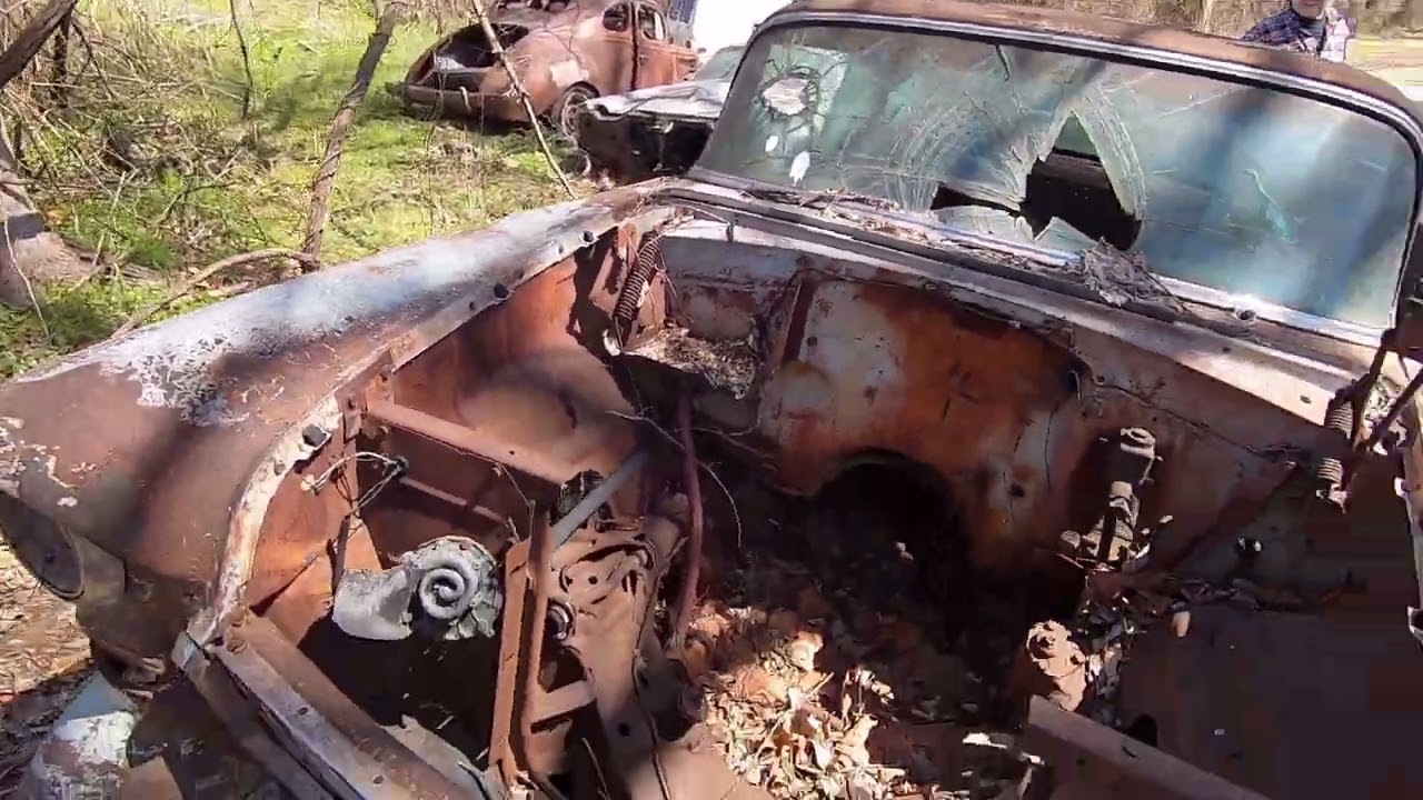 Part 1 Old car salvage tour. Lots of Tri 5 Chevys. Very sad