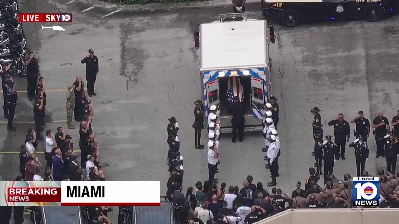 Miami Beach police officer's body arrives in casket after procession