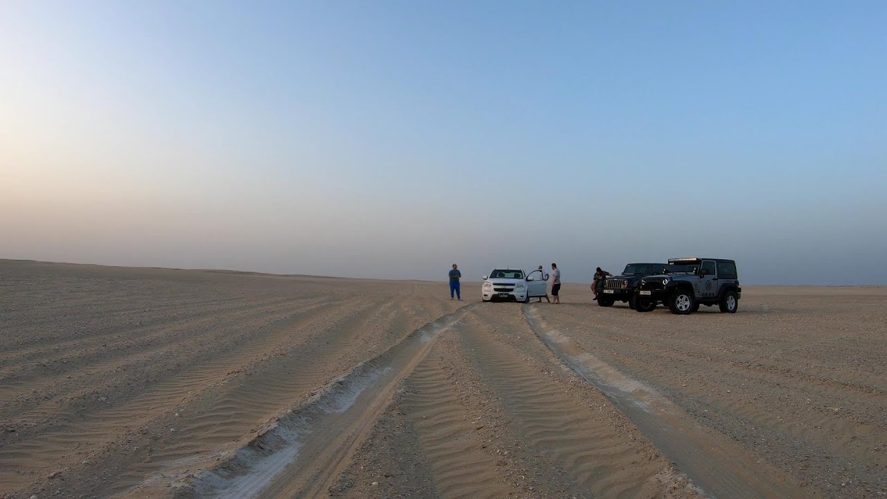 Qatar, Inland Sea, Winch Recovery of a Chevy Pick Up Truck from soft sand, in Khor Al Udeid