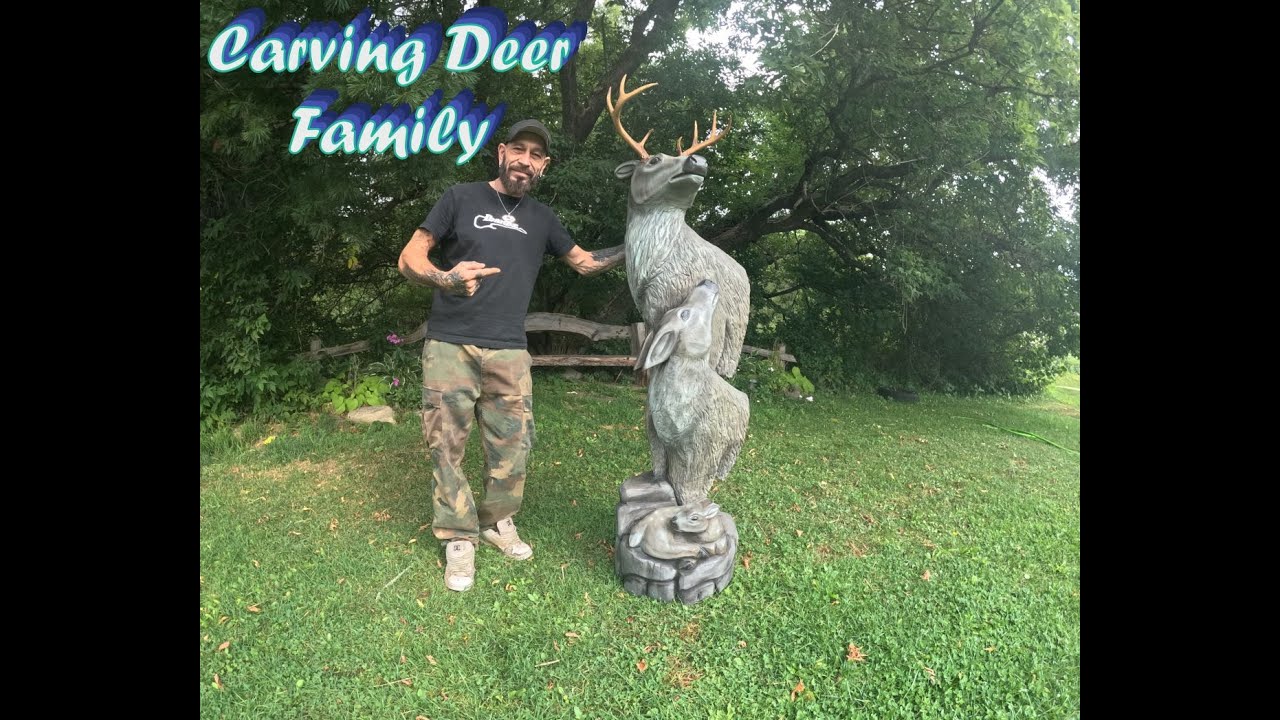 Deer family chainsaw carving