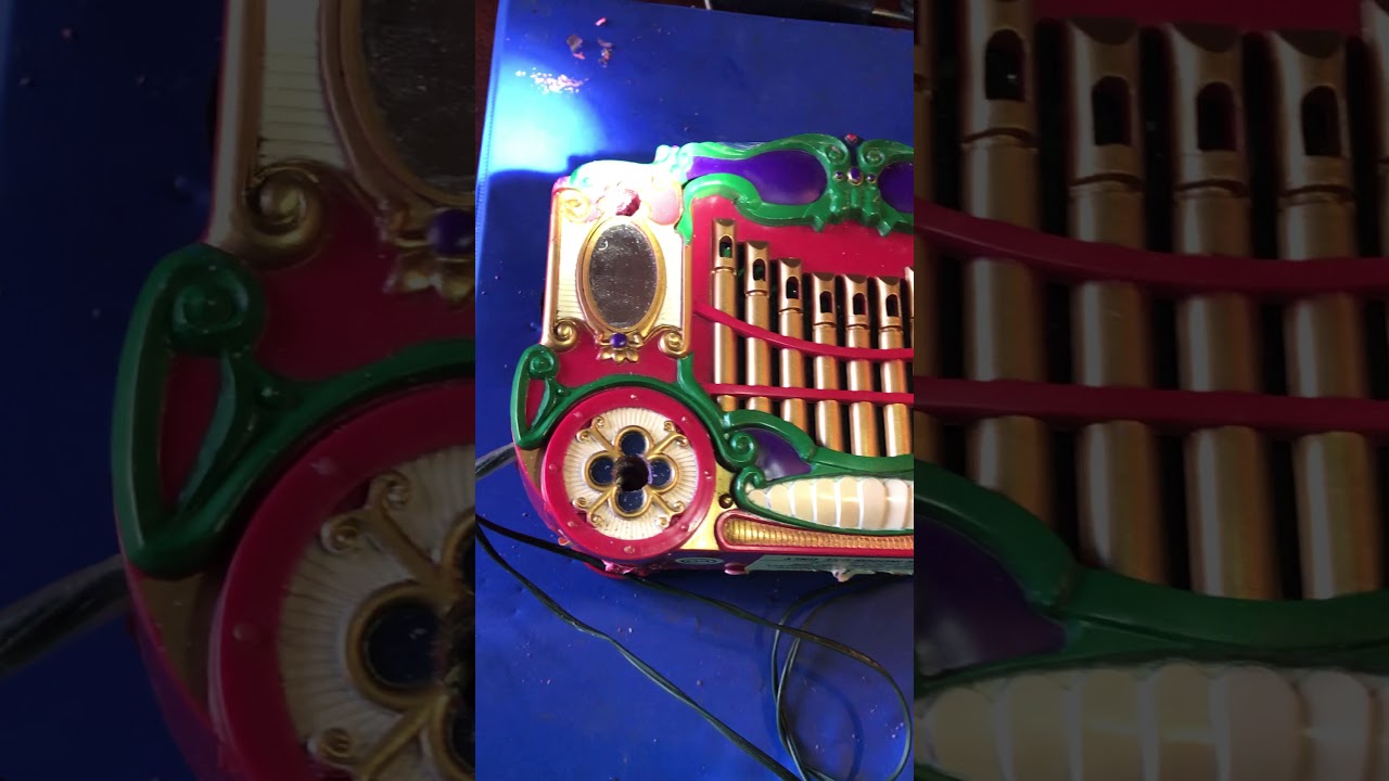 Opening Mr. Christmas Holiday Carousel for repair