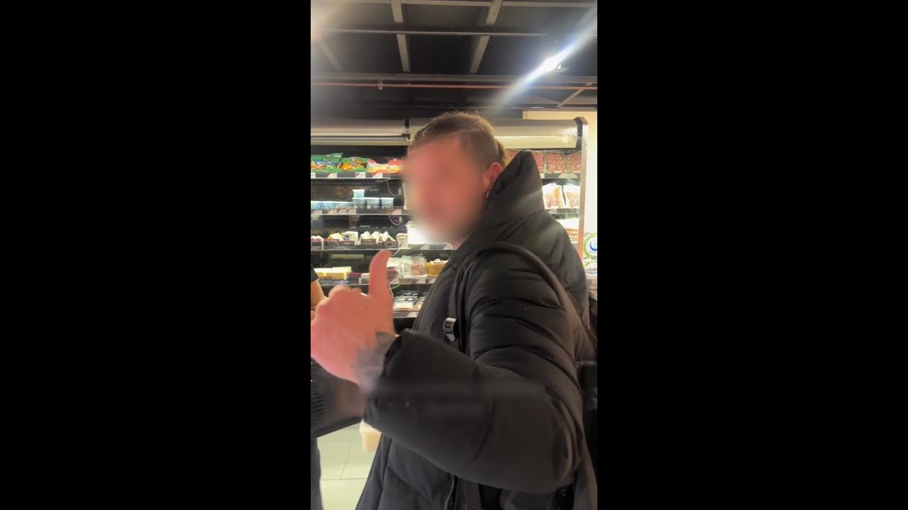 Woman confronts alleged racist in busy shopping centre