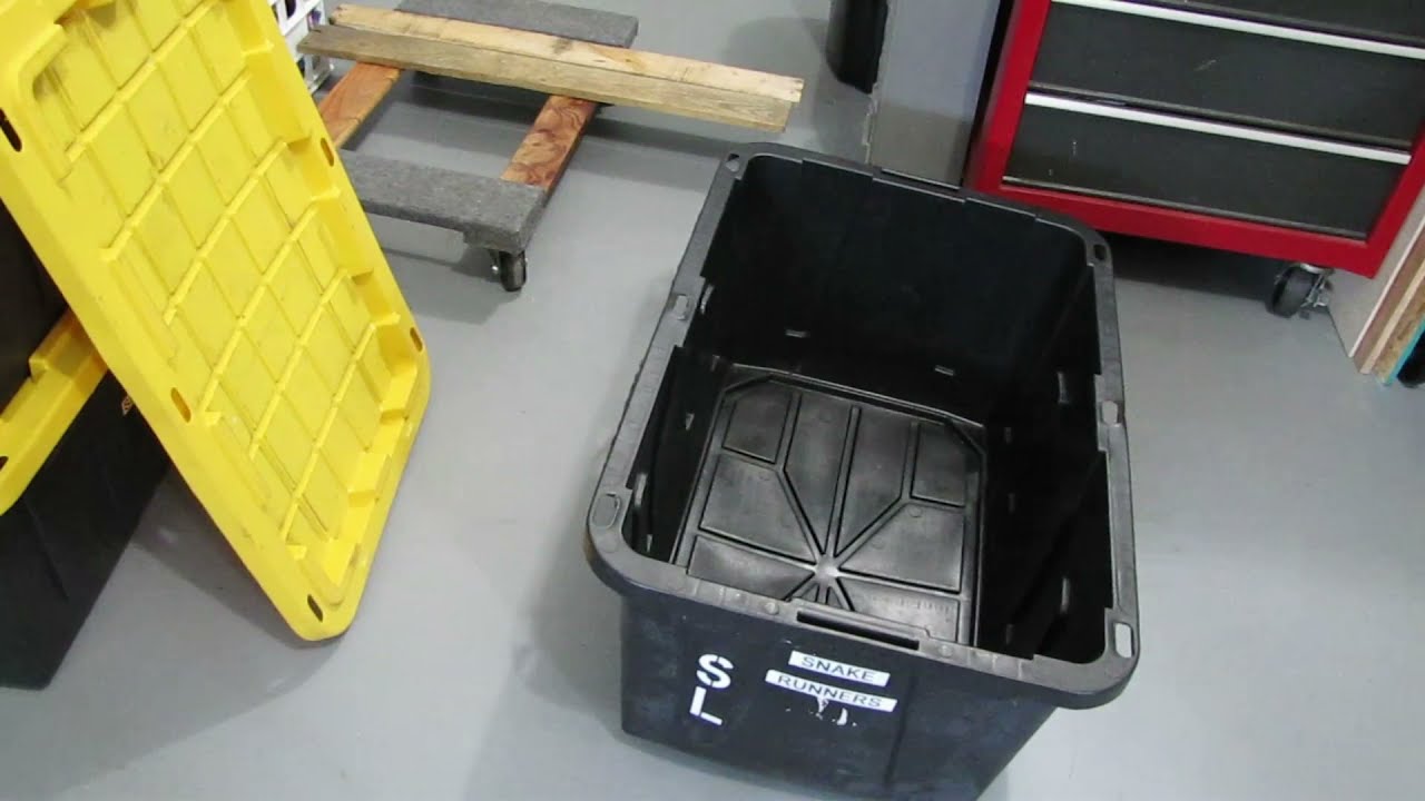 Fixing the bottom/floor of some of our plastic containers.  We use plywood to support the containers