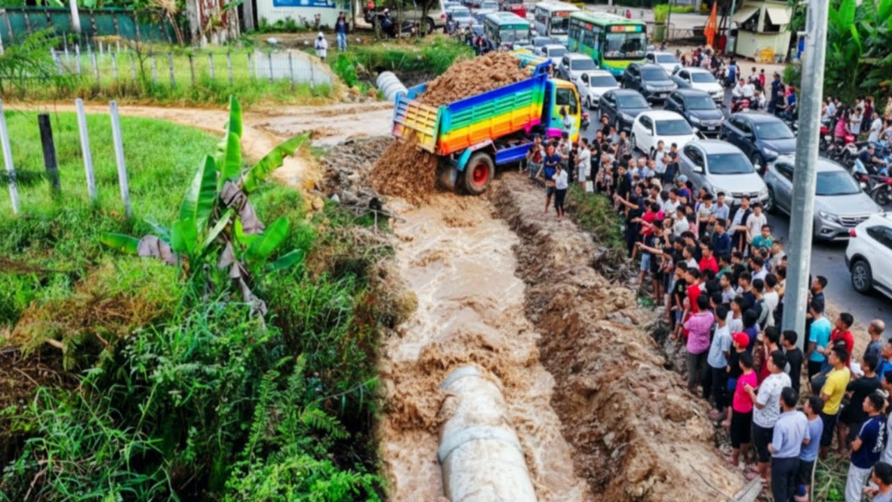 Delete Drainage Across Water Go Home By Skill Bulldozer Pushing Soil & Dump Truck Unloading Soil