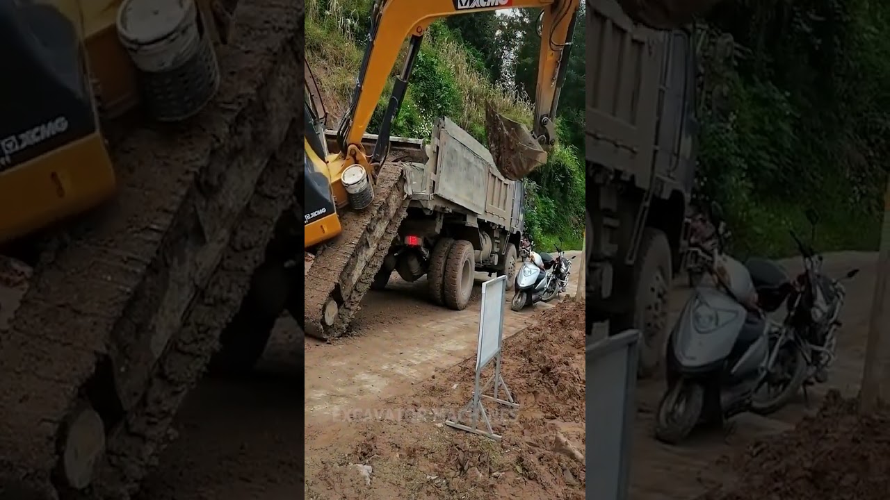 Excavator climbs on truck. unbelievable