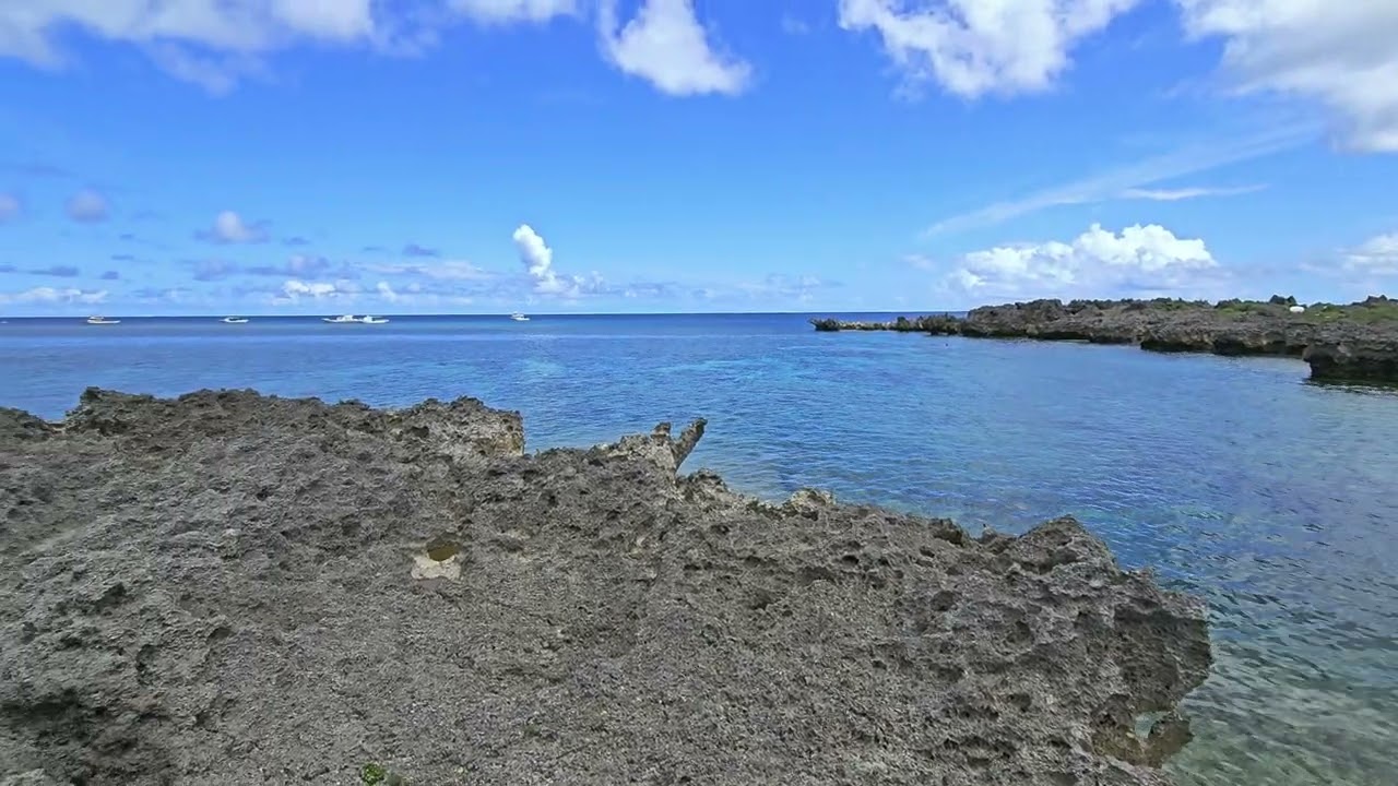 View of Ocean, Snorkelers & Dive Boats - Irabu Island - Okinawa Japan