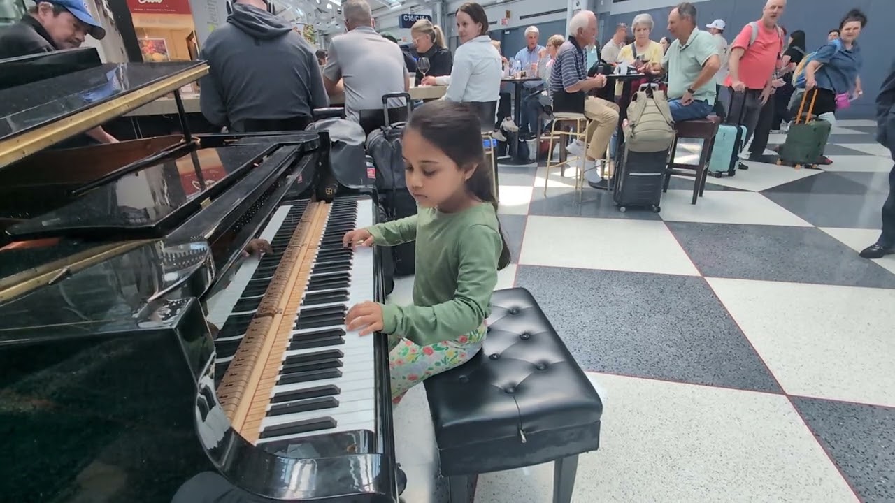 #ORD #8yrold #pianist just entertaining people before our flight #GauriJindal