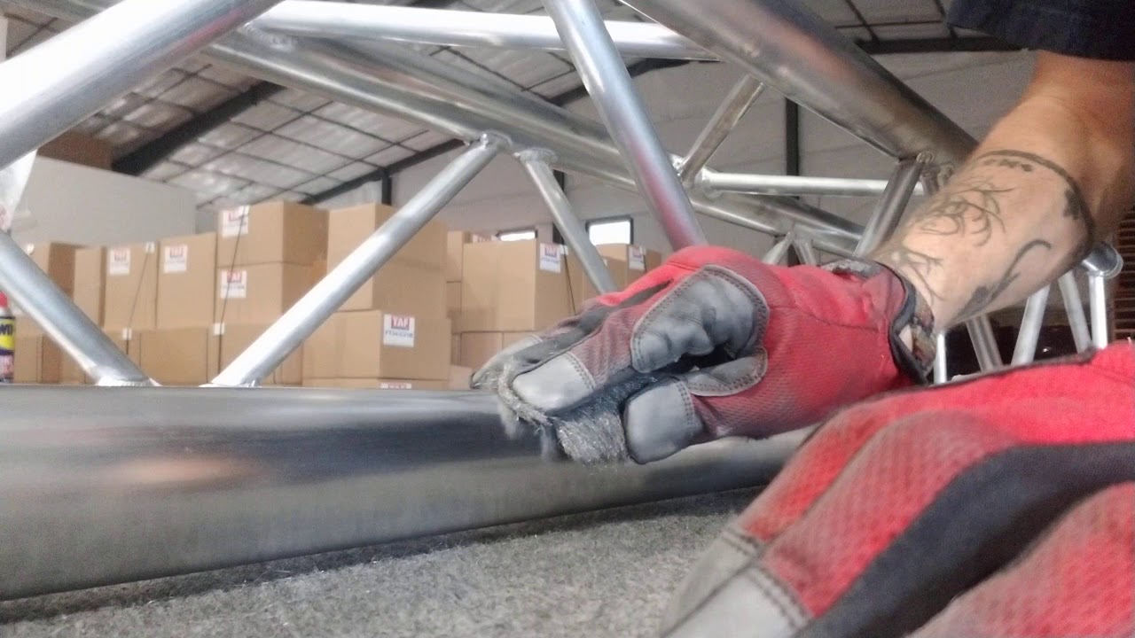 Polishing Aluminium Truss with Steel Wool
