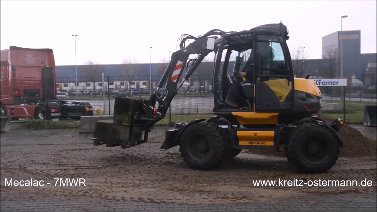 Mecalac 7MWR - Baggern, Laden, Stapeln, Schnellwechsler
