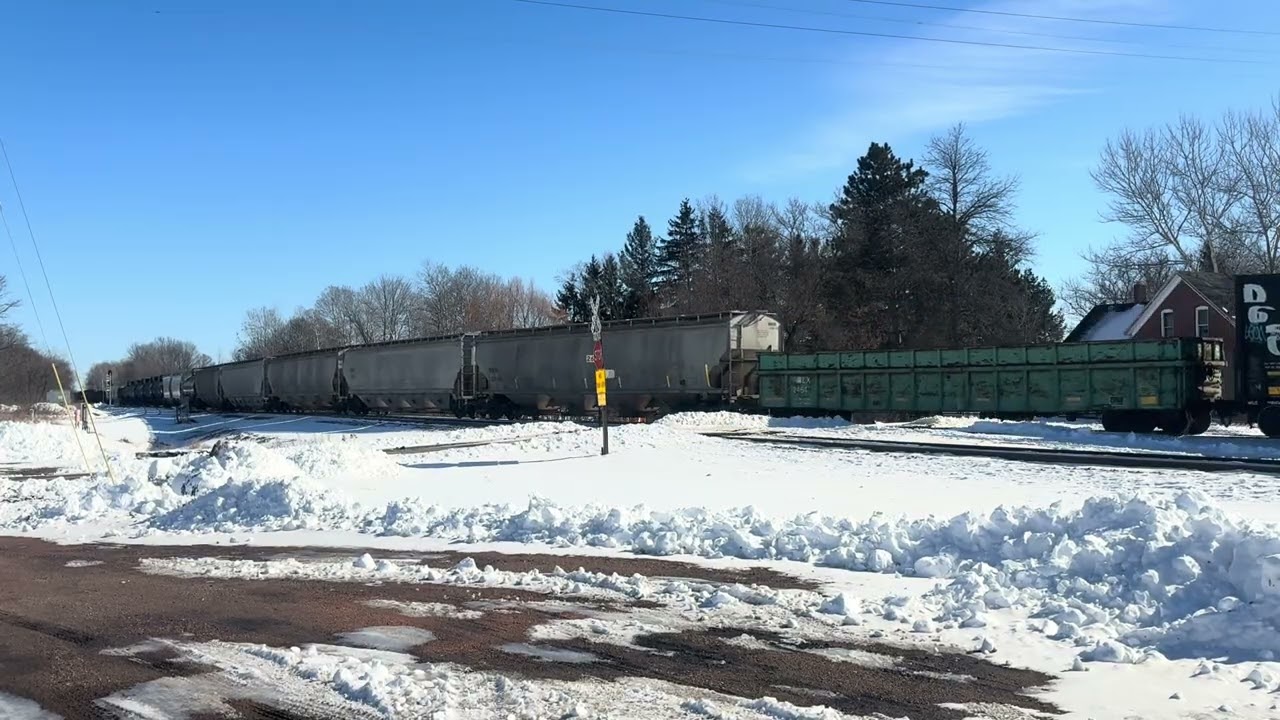 CN3066 ET44AC Tier 4 Leads A491 Wisconsin Rapids. Trailing Unit CN8357 SD75IACC helps Pull A491.