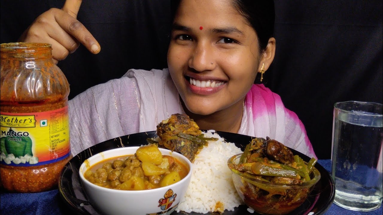 Eating show spicy fish curry and spicy Soybean and rice