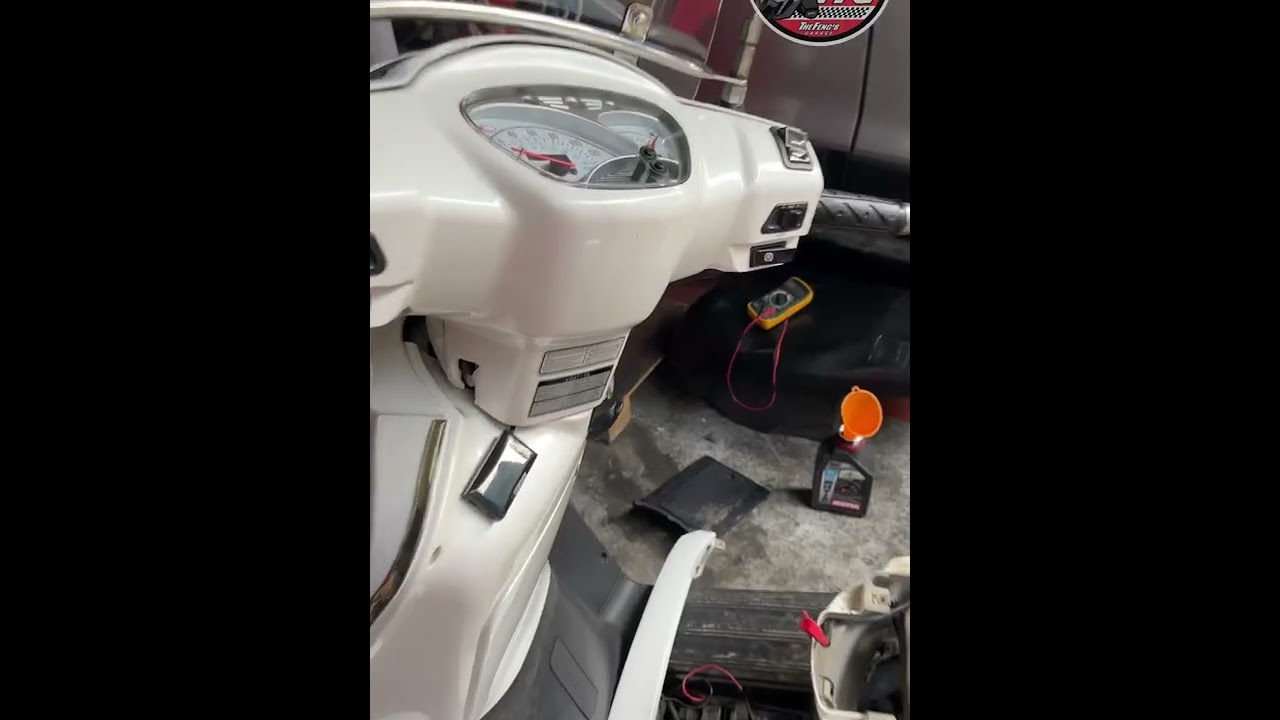 Kymco Like 125 submerged in flood.