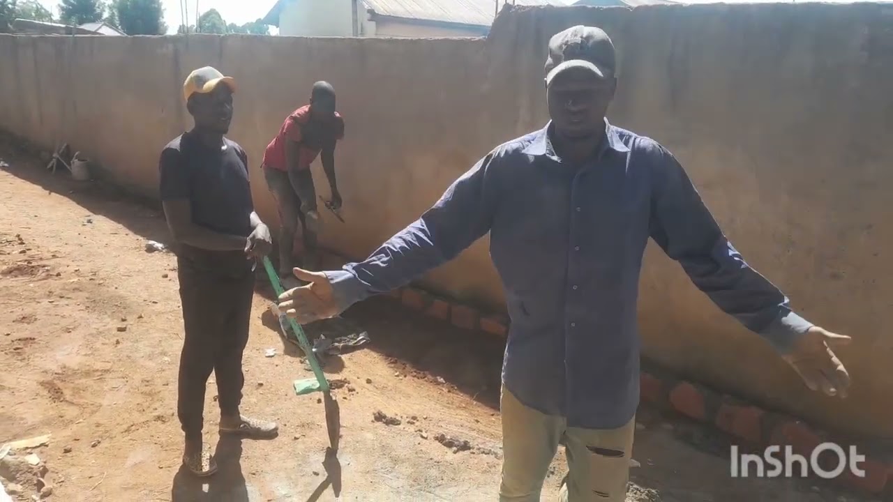 3rd  on how to plaster  the wall on momokoro primary  school 