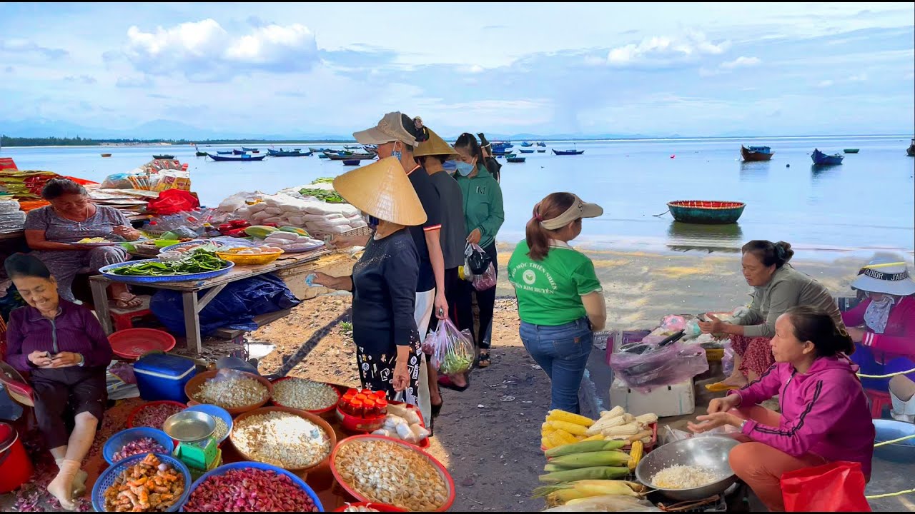 The village market filled with laughter in Quang Ngai, Vietnam.