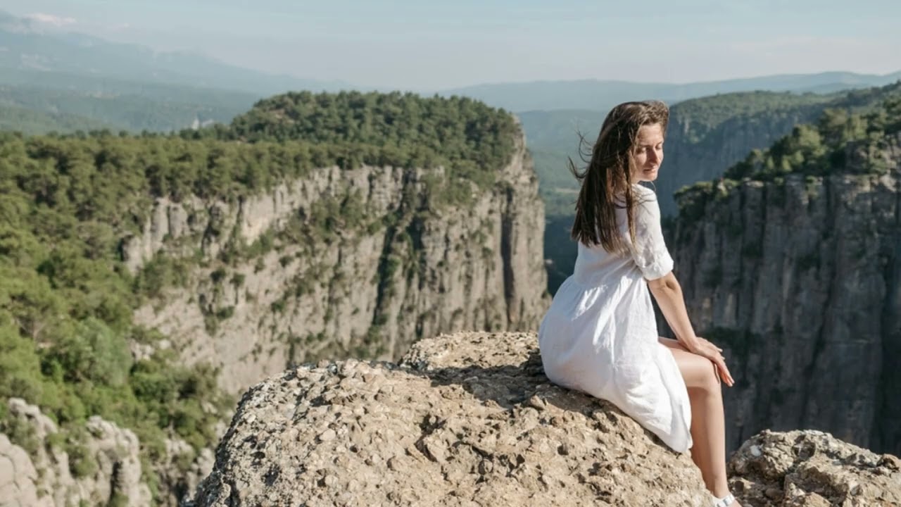 A Woman Sitting on a Cliff episode 41 By Entertainment video​ TV