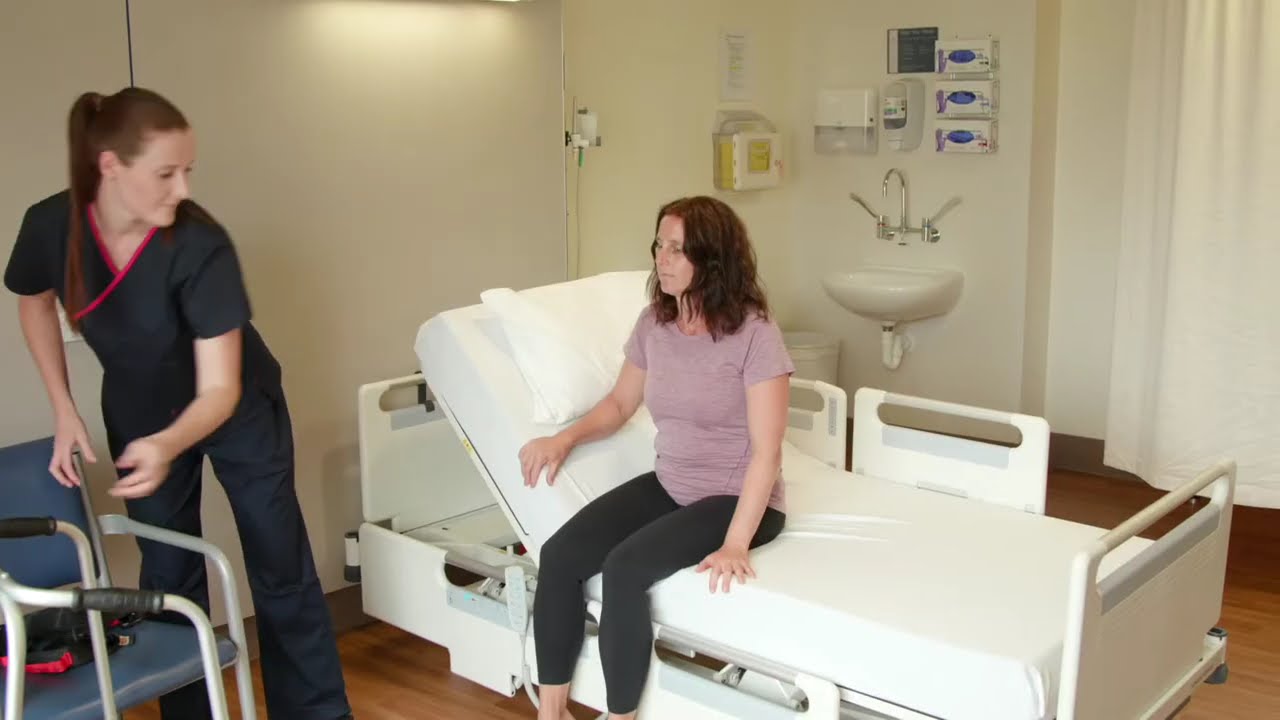 M10 Bed - Getting on and off the bed - fully dependent patient